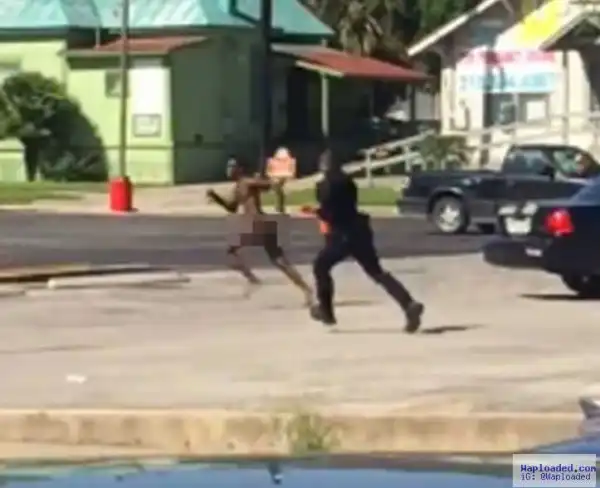 Photos: Naked man causes pandemonium as he runs up and down major highway
